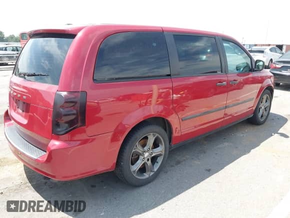 2014 Dodge Grand Caravan SE with VIN 2C4RDGBG4ER366720, listed as a IAAI auction lot 42805442 with 176,562 mi miles and . Bid and sale history available at DreamBid. Image 4.