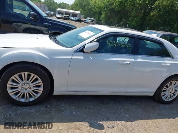 2013 Chrysler 300 with VIN 2C3CCARGXDH669215, listed as a IAAI auction lot 42458243 with 156,880 mi miles and . Bid and sale history available at DreamBid. Image 14.