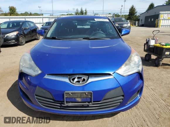 2013 Hyundai Veloster w/Gray Int z VIN KMHTC6ADXDU176024, wystawiony jako Copart lot #82231875 z przebiegiem 115 819 mil mil oraz Czysty tytuł • Clean title. Historia ofert i sprzedaży dostępna na DreamBid. Obrazek 5.