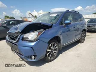 2017 Subaru Forester Touring z VIN JF2SJGWC0HH484234, wystawiony jako Copart lot #66384665 z przebiegiem 146 276 mil mil oraz Szkoda całkowita • Salvage title. Historia ofert i sprzedaży dostępna na DreamBid. Obrazek 1.