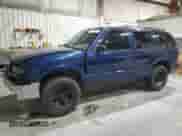 2000 Chevrolet Blazer LS z VIN 1GNCS13W7YK297644, wystawiony jako Copart lot #70089505 z przebiegiem 264 962 mil mil oraz Szkoda całkowita • Salvage title. Historia ofert i sprzedaży dostępna na DreamBid. Obrazek 1.