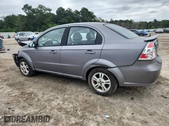 2011 Chevrolet Aveo 2LT с VIN KL1TG5DEXBB221597, выставлен на аукционе Copart как лот 71108655 с пробегом 103 582 миль миль и Списание • Salvage title. История ставок и продаж доступна на DreamBid. Изображение 2.