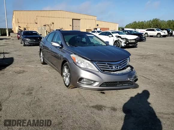 2013 Hyundai Azera с VIN KMHFH4JG6DA312812, выставлен на аукционе Copart как лот 86901174 с пробегом 256 370 миль миль и Списание • Salvage title. История ставок и продаж доступна на DreamBid. Изображение 10.
