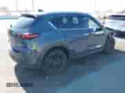 2022 Mazda CX-5 S Preferred z VIN JM3KFBCM2N1565165, wystawiony jako IAAI lot #42507203 z przebiegiem 39 853 mil mil oraz . Historia ofert i sprzedaży dostępna na DreamBid. Obrazek 4.