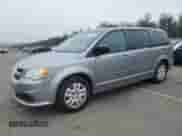 2014 Dodge Grand Caravan American Value with VIN 2C4RDGBG2ER141177, listed as a Copart auction lot 58329325 with 230,825 mi miles and Clean title. Bid and sale history available at DreamBid. Image 1.