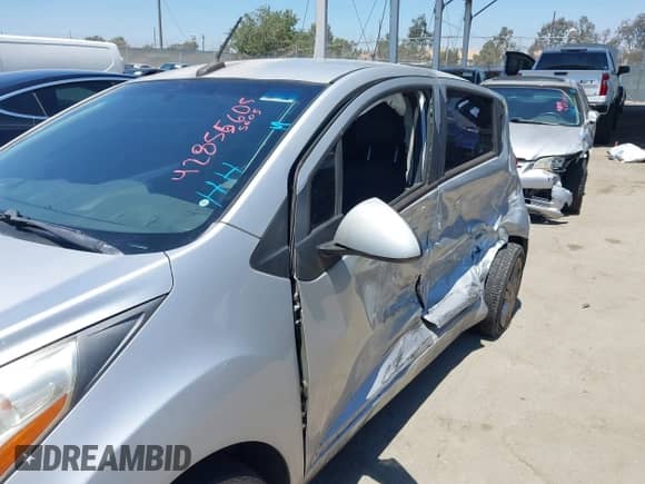 2014 Chevrolet Spark LT z VIN KL8CD6S95EC510892, wystawiony jako IAAI lot #42865605 z przebiegiem 112 138 mil mil oraz . Historia ofert i sprzedaży dostępna na DreamBid. Obrazek 6.