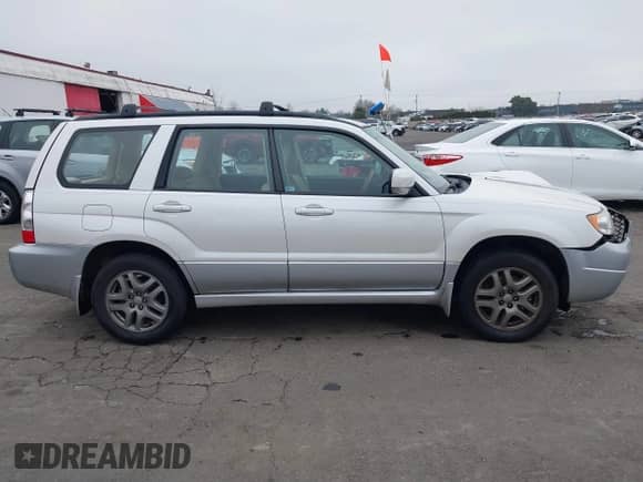2007 Subaru Forester X L.L. Bean with VIN JF1SG67617H715811, listed as a IAAI auction lot 41332386 with 106,361 mi miles and . Bid and sale history available at DreamBid. Image 13.