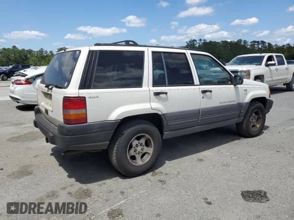 1996 Jeep Grand Cherokee with VIN 1J4EZ58S4TC151483, listed as a Copart auction lot 54982455 with Not provided miles and Salvage title. Bid and sale history available at DreamBid. Image 3.