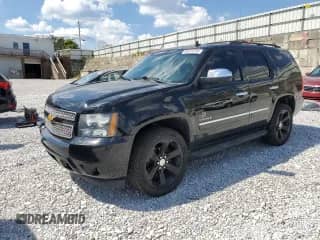 2014 Chevrolet Tahoe LTZ z VIN 1GNSKCE03ER112802, wystawiony jako Copart lot #80475795 z przebiegiem 254 450 mil mil oraz Czysty tytuł • Clean title. Historia ofert i sprzedaży dostępna na DreamBid. Obrazek 1.