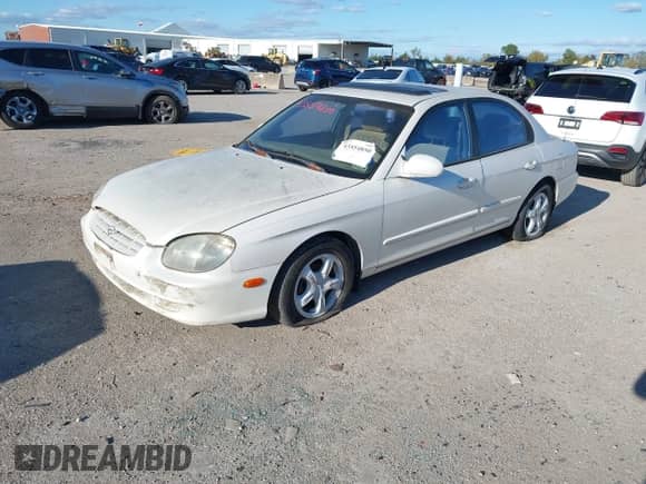 2001 Hyundai Sonata with VIN KMHWF25S41A403128, listed as a IAAI auction lot 43554850 with 212,602 mi miles and . Bid and sale history available at DreamBid. Image 2.