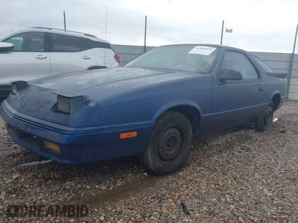 1990 Dodge Daytona with VIN 1B3XG24K8LG509073, listed as a IAAI auction lot 41806829 with 143,972 mi miles and . Bid and sale history available at DreamBid. Image 2.