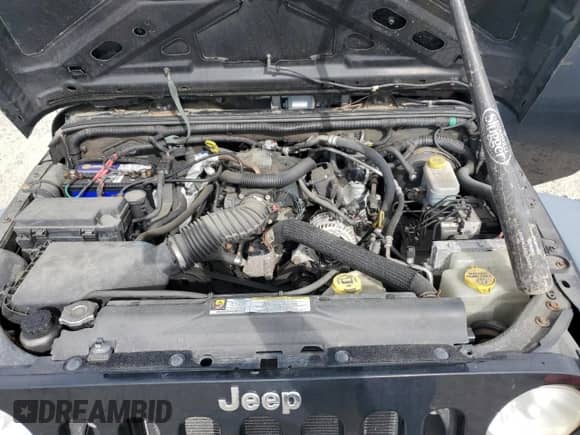 2010 Jeep Wrangler Sport с VIN 1J4AA2D14AL157508, выставлен на аукционе Copart как лот 68576645 с пробегом 216 261 миль миль и Чистый • Clean title. История ставок и продаж доступна на DreamBid. Изображение 11.