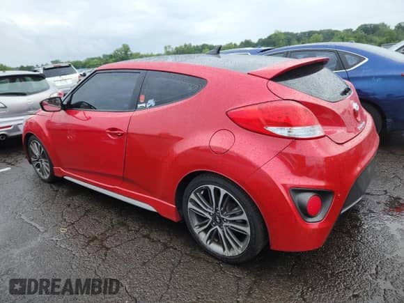 2017 Hyundai Veloster Turbo с VIN KMHTC6AE7HU308512, выставлен на аукционе Copart как лот 63842705 с пробегом 118 296 миль миль и Списание • Salvage title. История ставок и продаж доступна на DreamBid. Изображение 2.
