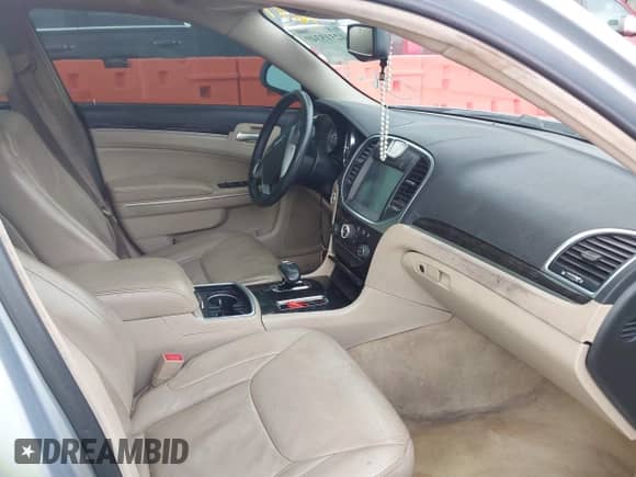 2013 Chrysler 300 with VIN 2C3CCAAGXDH707697, listed as a IAAI auction lot 42315349 with Not provided miles and . Bid and sale history available at DreamBid. Image 5.