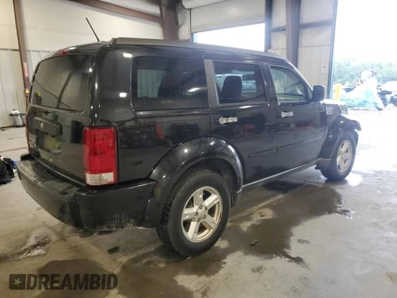 2008 Dodge Nitro SXT with VIN 1D8GT28K58W117204, listed as a Copart auction lot 67197825 with 185,175 mi miles and Salvage title. Bid and sale history available at DreamBid. Image 3.