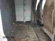 2017 Chevrolet Express Cargo z VIN 1GCWGBFF4H1122833, wystawiony jako Copart lot #85538934 z przebiegiem Nie podano mil oraz Szkoda całkowita • Salvage title. Historia ofert i sprzedaży dostępna na DreamBid. Obrazek 11.