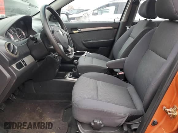 2007 Chevrolet Aveo LS z VIN KL1TD56637B057387, wystawiony jako Copart lot #77928504 z przebiegiem 129 014 mil mil oraz Szkoda całkowita • Salvage title. Historia ofert i sprzedaży dostępna na DreamBid. Obrazek 7.