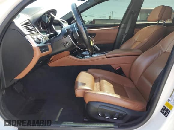 2016 BMW 5 Series 550i xDrive with VIN WBAKP9C50GD981138, listed as a Copart auction lot 66470895 with 105,258 mi miles and Salvage title. Bid and sale history available at DreamBid. Image 7.