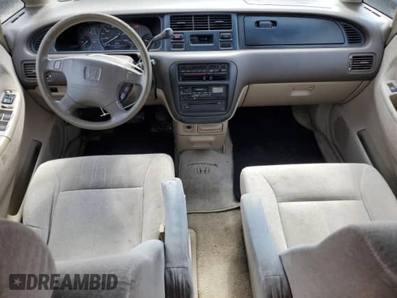 1997 Honda Odyssey with VIN JHMRA1847VC014113, listed as a Copart auction lot 59270225 with 118,136 mi miles and Salvage title. Bid and sale history available at DreamBid. Image 8.