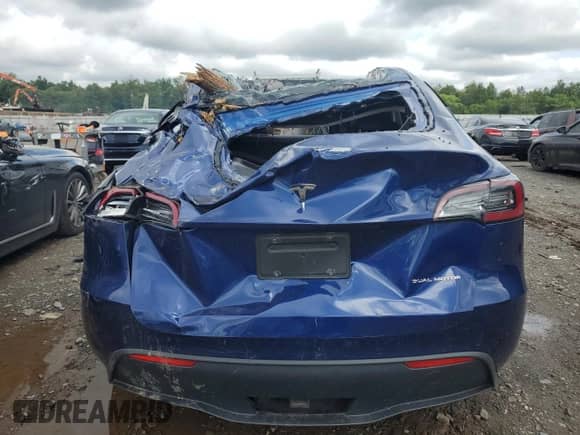 2020 Tesla Model Y Long Range with VIN 5YJYGDEE2LF015602, listed as a Copart auction lot 67719774 with Not provided miles and Salvage title. Bid and sale history available at DreamBid. Image 6.