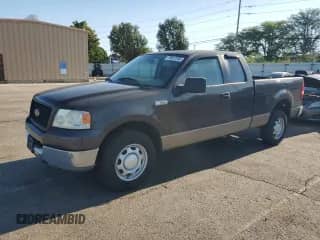 2005 Ford F-150 XLT with VIN 1FTPX12595FA06845, listed as a Copart auction lot 70637355 with 239,977 mi miles and Clean title. Bid and sale history available at DreamBid. Image 1.