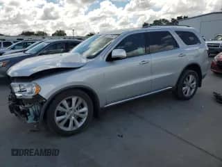 2012 Dodge Durango Crew with VIN 1C4SDJDT0CC112663, listed as a Copart auction lot 56706625 with 162,416 mi miles and Salvage title. Bid and sale history available at DreamBid. Image 1.