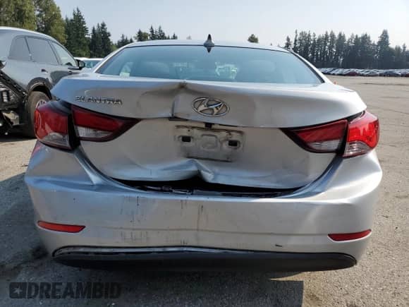 2014 Hyundai Elantra Limited with VIN KMHDH4AEXEU051416, listed as a Copart auction lot 82107055 with 77,749 mi miles and Salvage title. Bid and sale history available at DreamBid. Image 6.