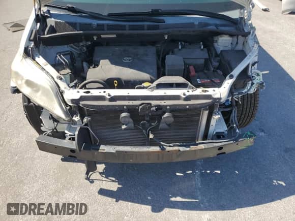 2012 Toyota Sienna XLE AAS with VIN 5TDYK3DC8CS190893, listed as a Copart auction lot 89573505 with 145,575 mi miles and Salvage title. Bid and sale history available at DreamBid. Image 12.