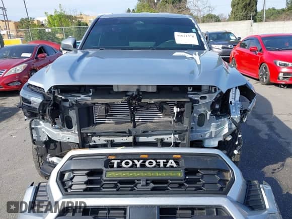 2024 Toyota Tacoma SR5 with VIN 3TMLB5JN6RM022612, listed as a IAAI auction lot 41611378 with 7,275 mi miles and . Bid and sale history available at DreamBid. Image 13.