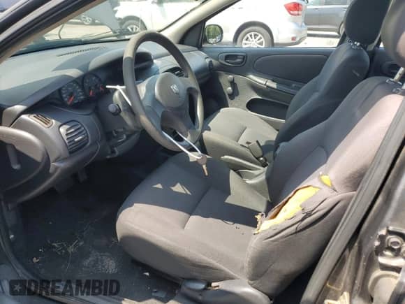 2004 Dodge Neon SE z VIN 1B3ES26C74D533797, wystawiony jako Copart lot #69045084 z przebiegiem 105 561 mil mil oraz Szkoda całkowita • Salvage title. Historia ofert i sprzedaży dostępna na DreamBid. Obrazek 7.