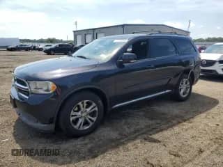 2011 Dodge Durango Crew with VIN 1D4SE4GT5BC631252, listed as a Copart auction lot 65360245 with 152,328 mi miles and Salvage title. Bid and sale history available at DreamBid. Image 1.
