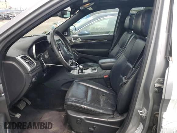 2015 Jeep Grand Cherokee High Altitude with VIN 1C4RJFCG9FC210586, listed as a Copart auction lot 64212165 with 119,340 mi miles and Salvage title. Bid and sale history available at DreamBid. Image 7.