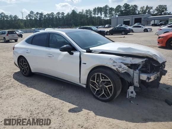 2022 Hyundai Sonata N Line with VIN KMHL14JC5NA225280, listed as a Copart auction lot 69826535 with 86,079 mi miles and Salvage title. Bid and sale history available at DreamBid. Image 4.