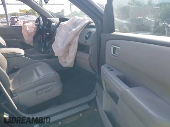 2013 Honda Pilot EX-L with VIN 5FNYF4H65DB060543, listed as a IAAI auction lot 42380911 with 330,452 mi miles and . Bid and sale history available at DreamBid. Image 5.