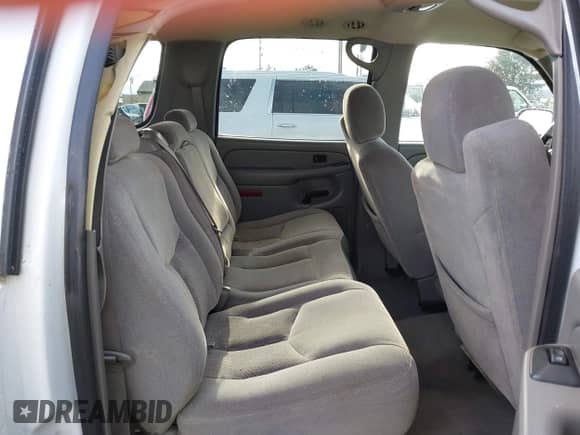 2004 Chevrolet Suburban LS z VIN 1GNFK16ZX4J115566, wystawiony jako IAAI lot #41702268 z przebiegiem 243 572 mil mil oraz . Historia ofert i sprzedaży dostępna na DreamBid. Obrazek 8.