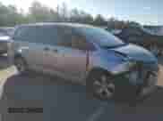 2012 Toyota Sienna with VIN 5TDZK3DC3CS210035, listed as a Copart auction lot 83798255 with 319,065 mi miles and Salvage title. Bid and sale history available at DreamBid. Image 4.