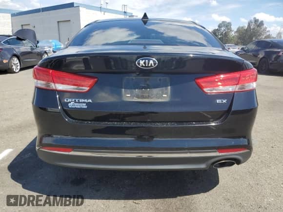 2016 Kia Optima EX с VIN 5XXGU4L30GG055573, выставлен на аукционе Copart как лот 81593815 с пробегом 312 687 миль миль и Списание • Salvage title. История ставок и продаж доступна на DreamBid. Изображение 6.