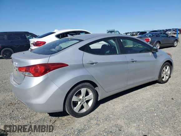 2012 Hyundai Elantra GLS with VIN KMHDH4AE4CU419859, listed as a Copart auction lot 82267225 with 187,070 mi miles and Salvage title. Bid and sale history available at DreamBid. Image 3.