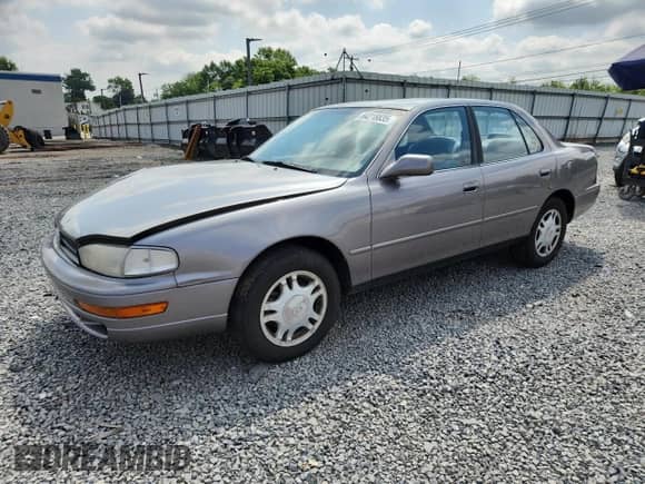 1993 Toyota Camry с VIN 4T1VK13E1PU075530, выставлен на аукционе Copart как лот 64218835 с пробегом 58 871 миль миль и Списание • Salvage title. История ставок и продаж доступна на DreamBid. Изображение 1.