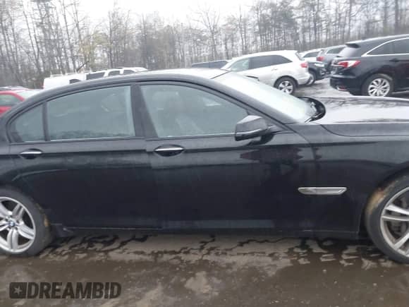 2013 BMW 7 Series 750Li с VIN WBAYE8C53DD133504, выставлен на аукционе IAAI как лот 42005346 с пробегом 142 894 миль миль и . История ставок и продаж доступна на DreamBid. Изображение 13.