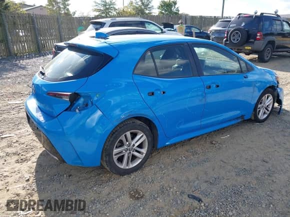2019 Toyota Corolla SE with VIN JTNK4RBE6K3014914, listed as a IAAI auction lot 43346142 with 77,038 mi miles and . Bid and sale history available at DreamBid. Image 4.