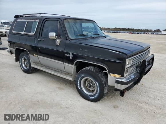 1984 Chevrolet Blazer K10 Utility HT with VIN 1G8EK18HXEF145495, listed as a Copart auction lot 76857274 with 40,041 mi miles and Salvage title. Bid and sale history available at DreamBid. Image 4.