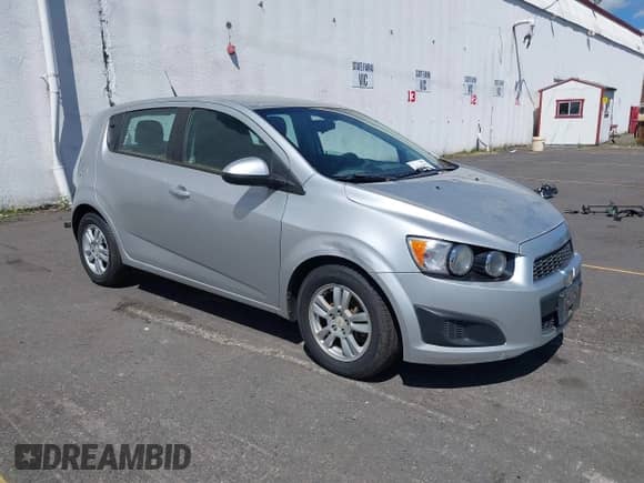 2012 Chevrolet Sonic LS with VIN 1G1JB6SHXC4116378, listed as a IAAI auction lot 42664573 with 145,244 mi miles and . Bid and sale history available at DreamBid. Image 1.