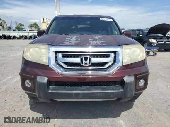 2010 Honda Pilot Touring с VIN 5FNYF4H97AB008479, выставлен на аукционе Copart как лот 63516435 с пробегом 204 150 миль миль и Чистый • Clean title. История ставок и продаж доступна на DreamBid. Изображение 5.