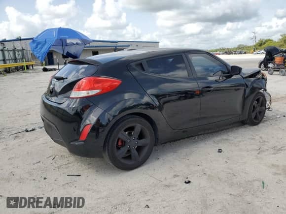 2014 Hyundai Veloster z VIN KMHTC6AD3EU196343, wystawiony jako Copart lot #59891375 z przebiegiem 127 594 mil mil oraz Szkoda całkowita • Salvage title. Historia ofert i sprzedaży dostępna na DreamBid. Obrazek 3.