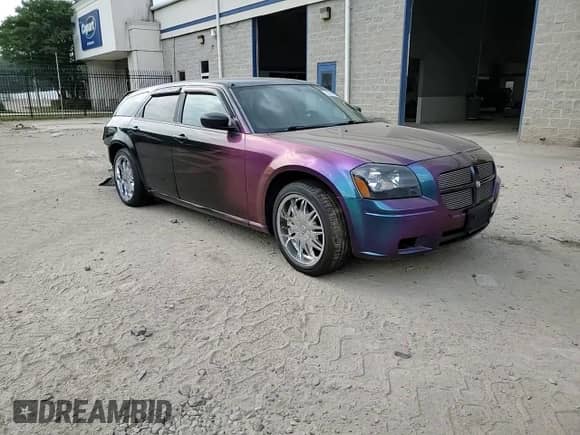 2005 Dodge Magnum SE with VIN 2D4FV48T25H161344, listed as a Copart auction lot 68303715 with 95,064 mi miles and Salvage title. Bid and sale history available at DreamBid. Image 14.