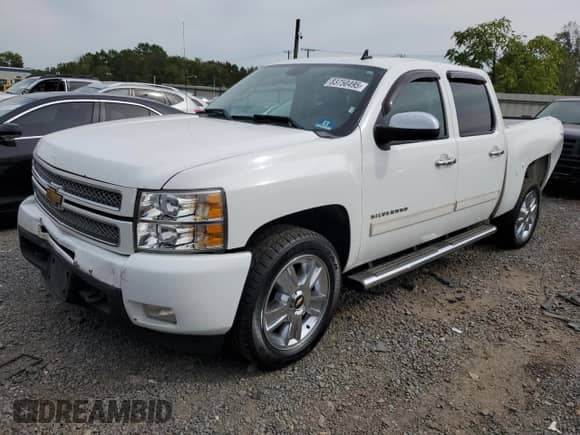2012 Chevrolet Silverado 1500 LTZ with VIN 1GCPKTE71CF124456, listed as a Copart auction lot 83750495 with 158,377 mi miles and Salvage title. Bid and sale history available at DreamBid. Image 1.