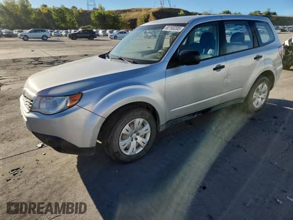 2010 Subaru Forester X with VIN JF2SH6AC7AH721594, listed as a Copart auction lot 80193205 with 191,820 mi miles and Salvage title. Bid and sale history available at DreamBid. Image 1.