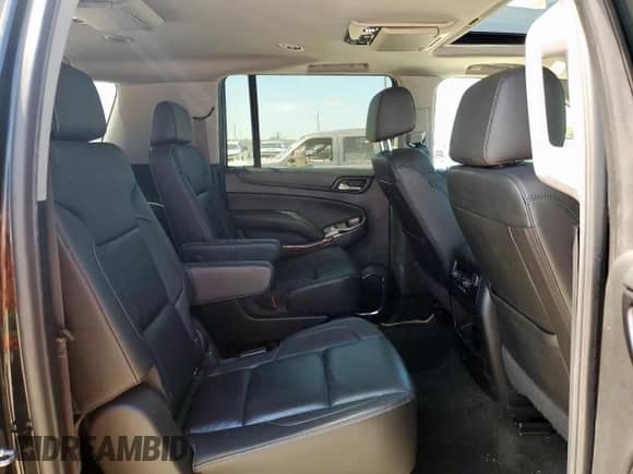 2017 Chevrolet Suburban Premier с VIN 1GNSKJKC7HR316042, выставлен на аукционе Copart как лот 65912715 с пробегом 98 027 миль миль и Списание • Salvage title. История ставок и продаж доступна на DreamBid. Изображение 11.