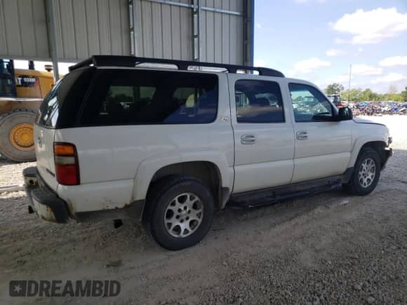 2003 Chevrolet Suburban Z71 с VIN 3GNFK16ZX3G193992, выставлен на аукционе Copart как лот 66001925 с пробегом 291 864 миль миль и Списание • Salvage title. История ставок и продаж доступна на DreamBid. Изображение 3.